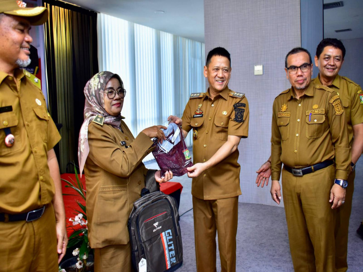 Pj. Bupati Kampar Membuka Pelatihan Peningkatan Kapasitas Pemerintah Desa Bagi Pj. Kepala Desa